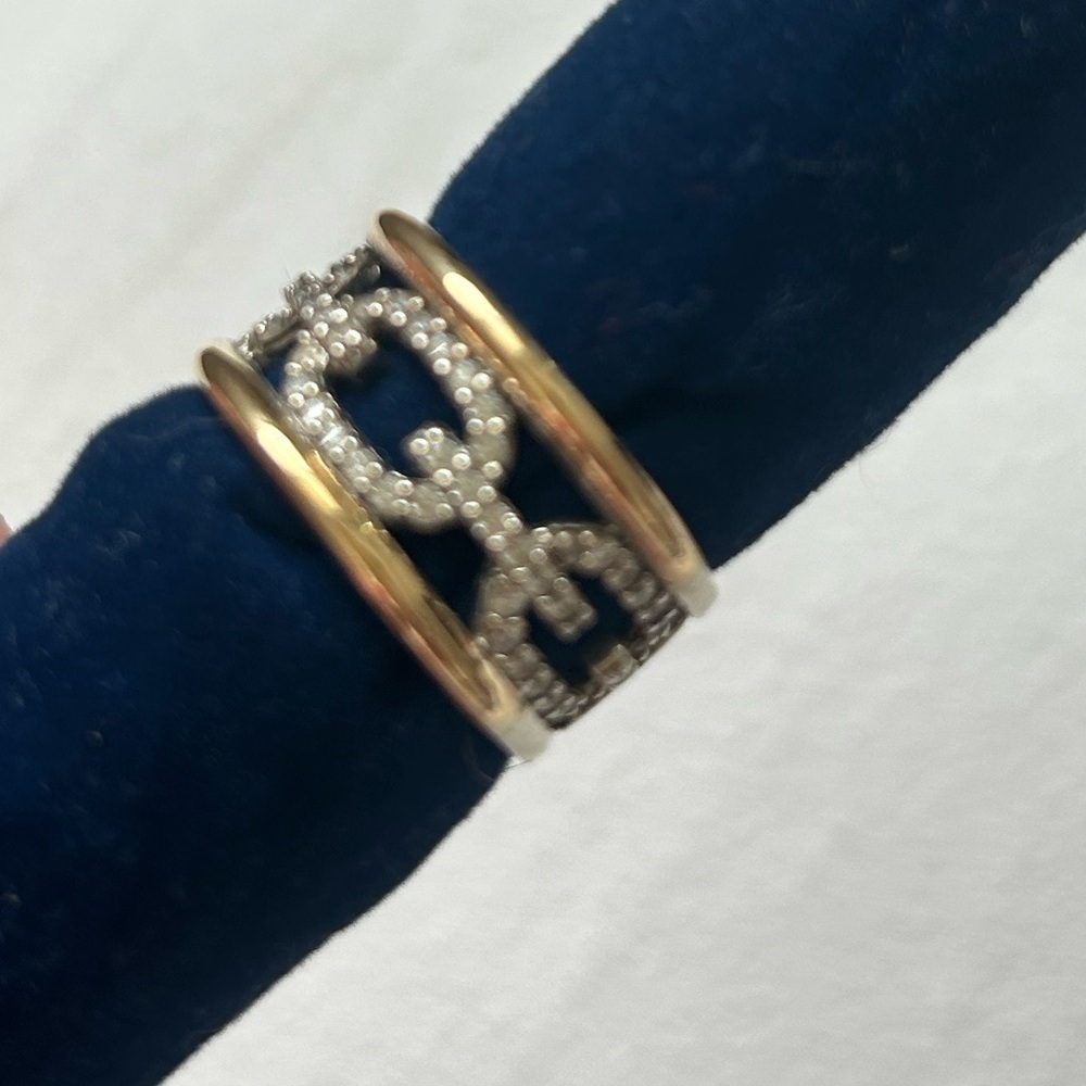 Ring of 925 rhodium-plated sterling silver and 18-carat gold with zircons,